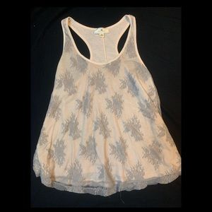 Medium. Tan with grey lace overlay.